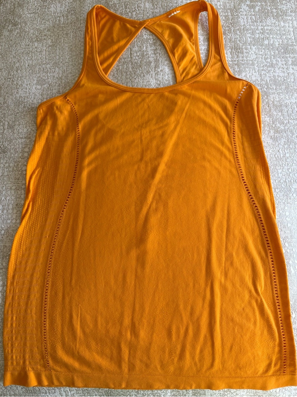 Stylish chic workout tank with super attractive back.